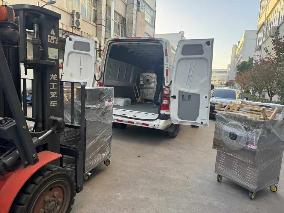 皇栗皇訂購許昌智工電磁炒貨機專車拉走